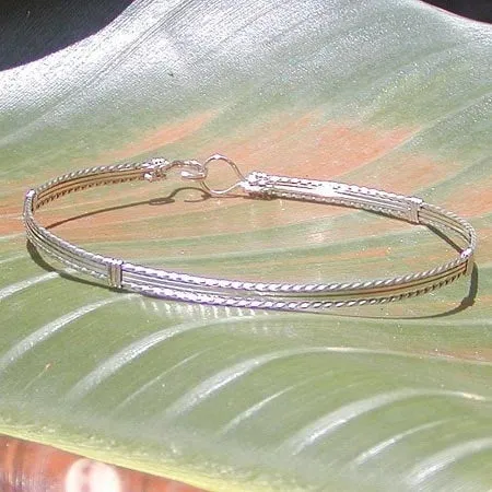 Sterling Silver 4-Strand Wirewrapped Stackable Bracelet  TSST
